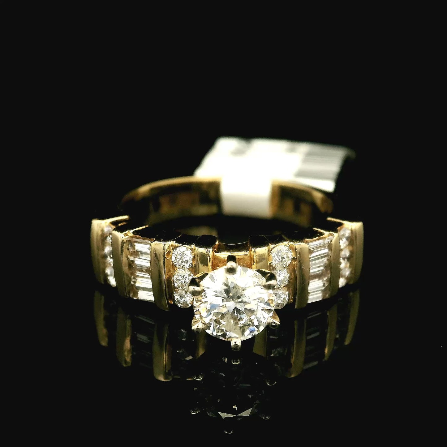Yellow Gold Multi-Diamond Ring with a Round Brilliant Cut Diamond