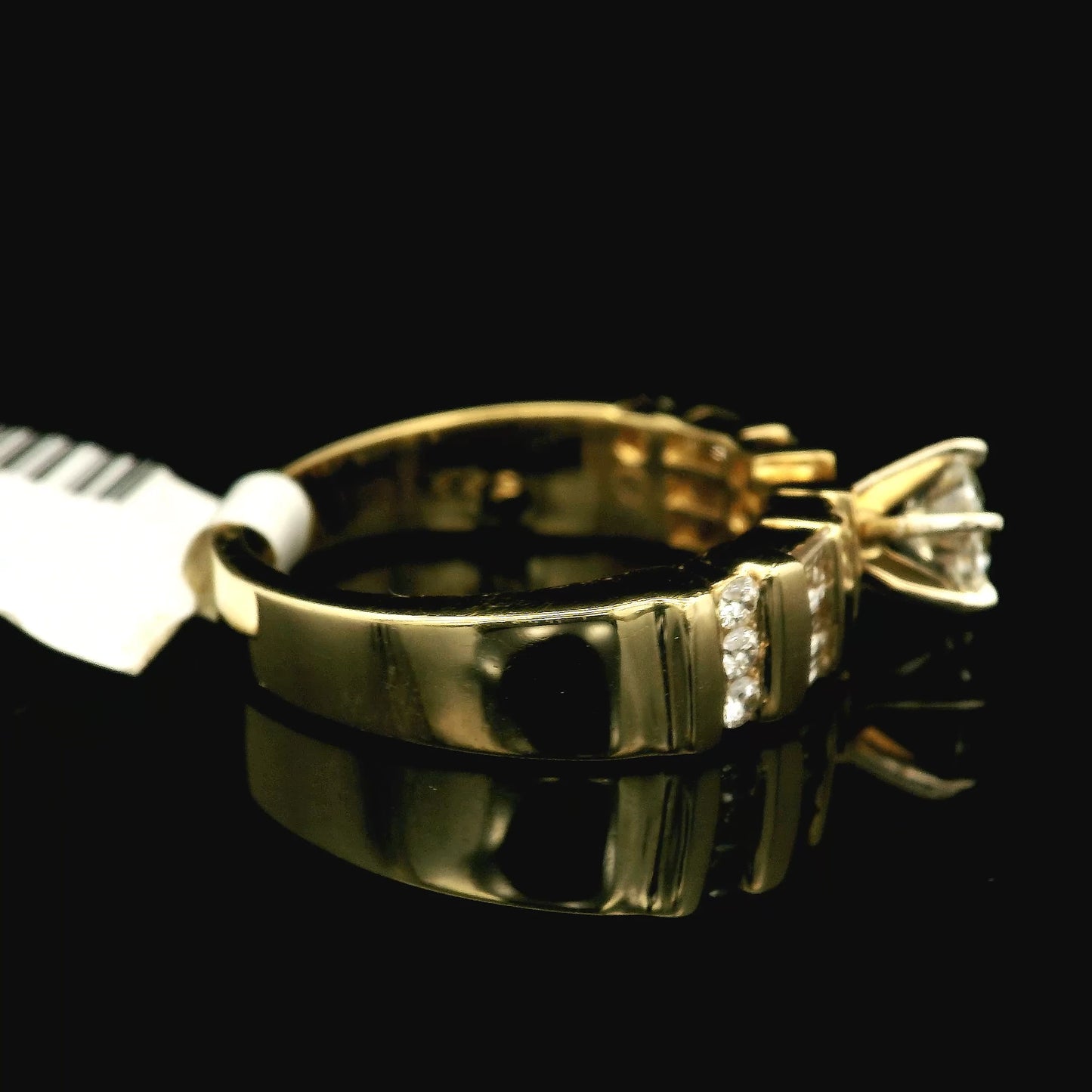Yellow Gold Multi-Diamond Ring with a Round Brilliant Cut Diamond