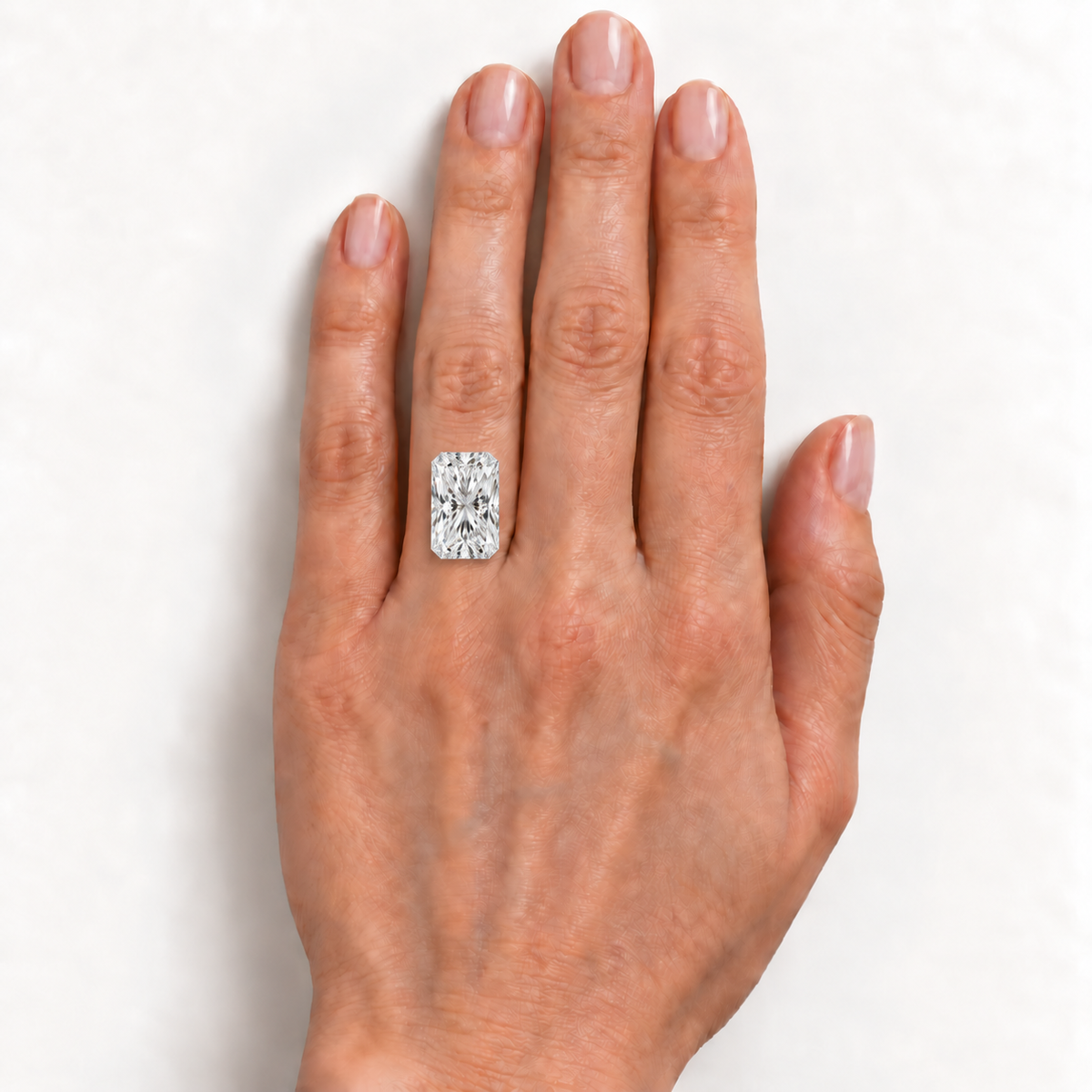 AI-generated on-hand size illustration; approximate scale, hand sizes vary