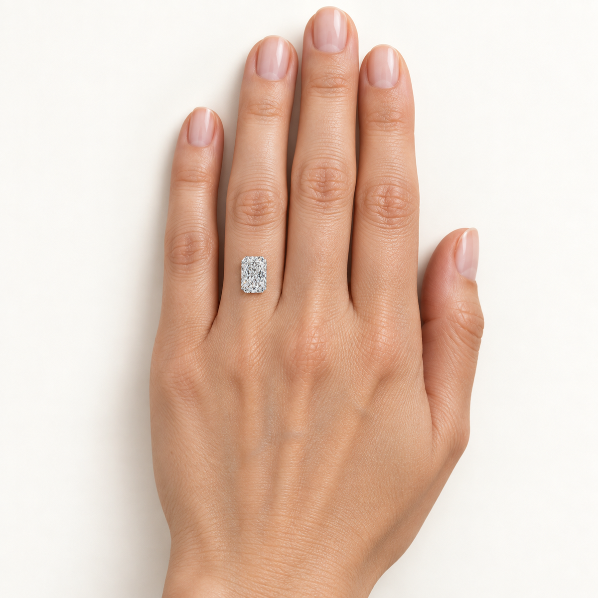 AI-generated on-hand size illustration; approximate scale, hand sizes vary