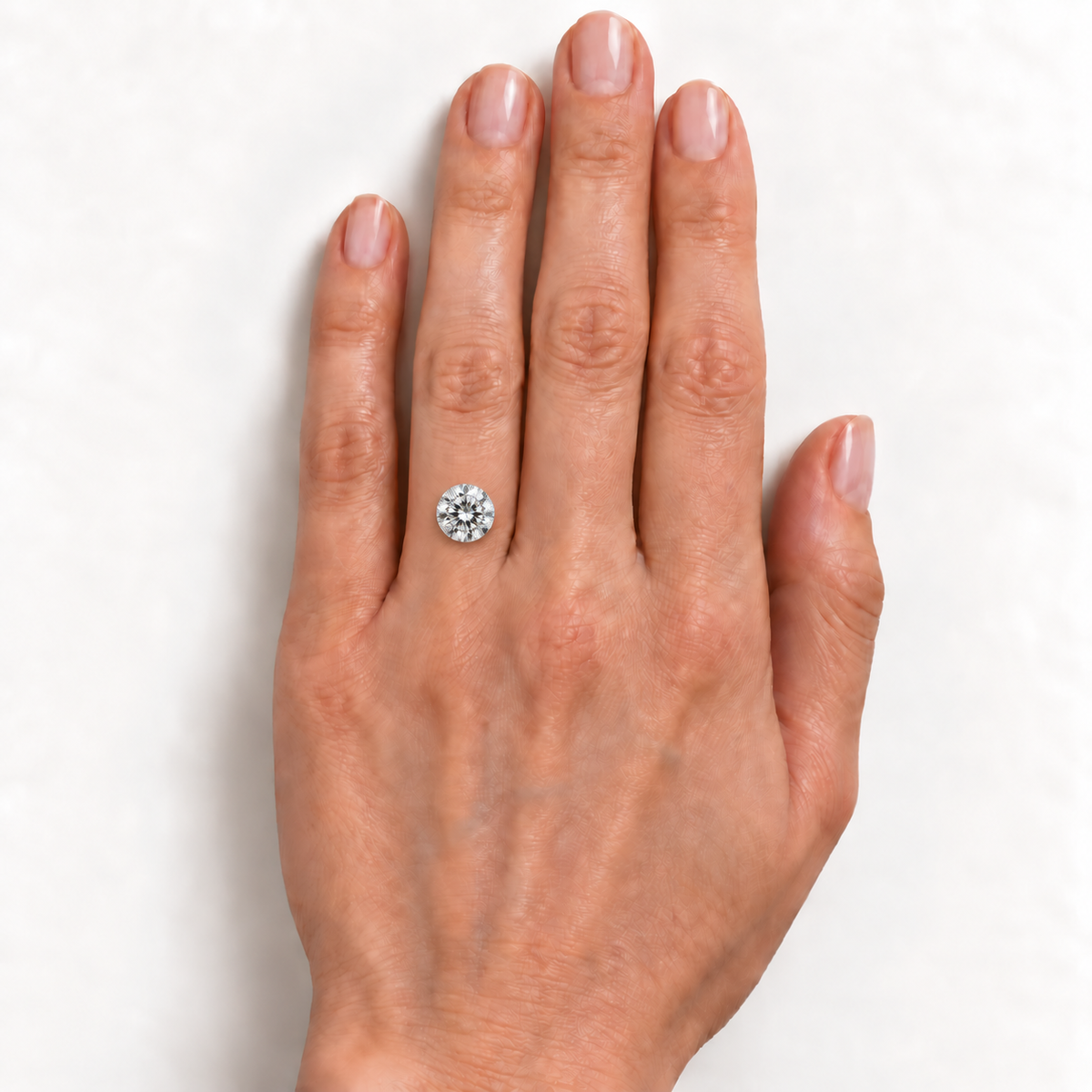 AI-generated on-hand size illustration; approximate scale, hand sizes vary